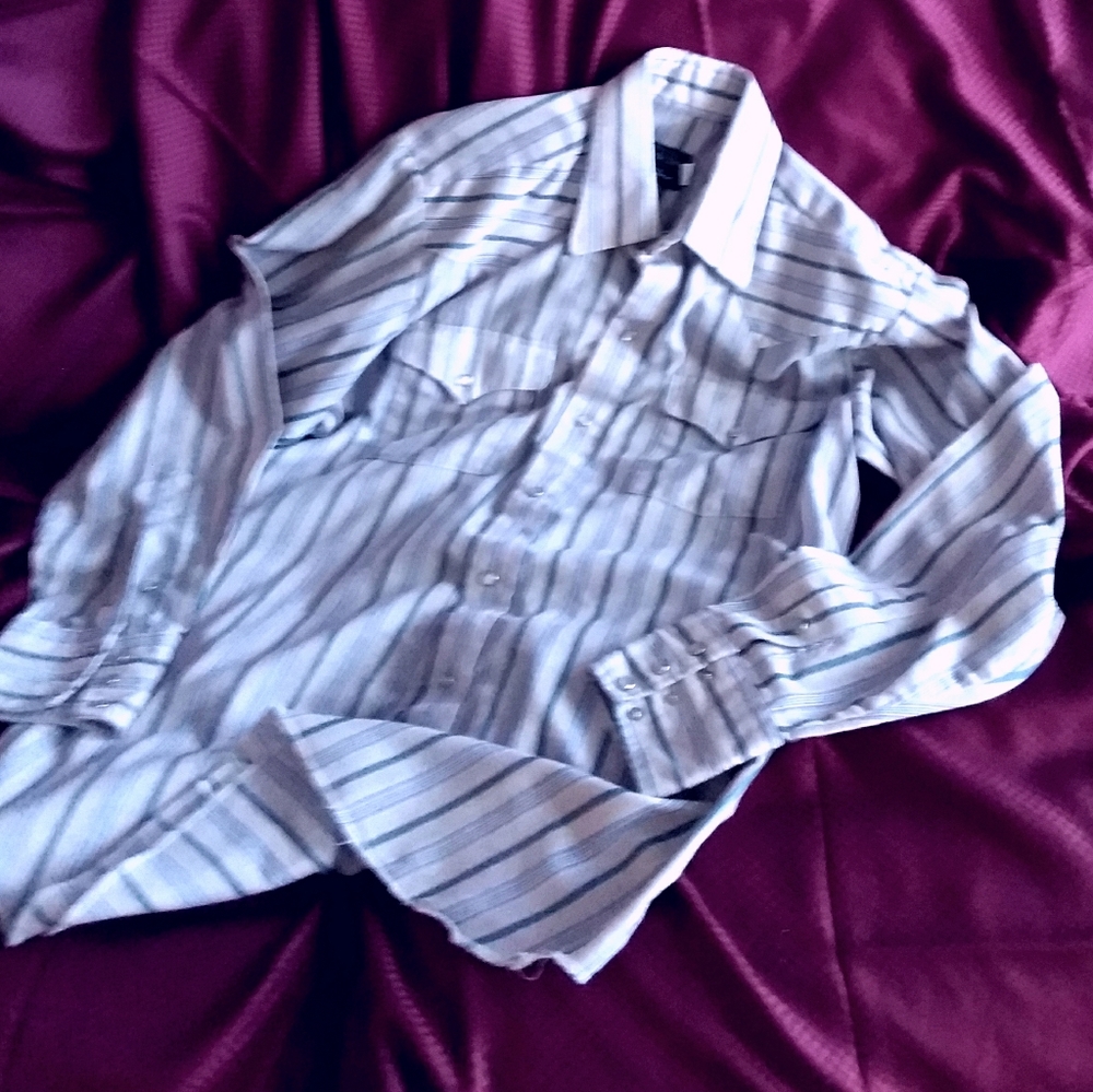 Men's long sleeved western style dress shirt.